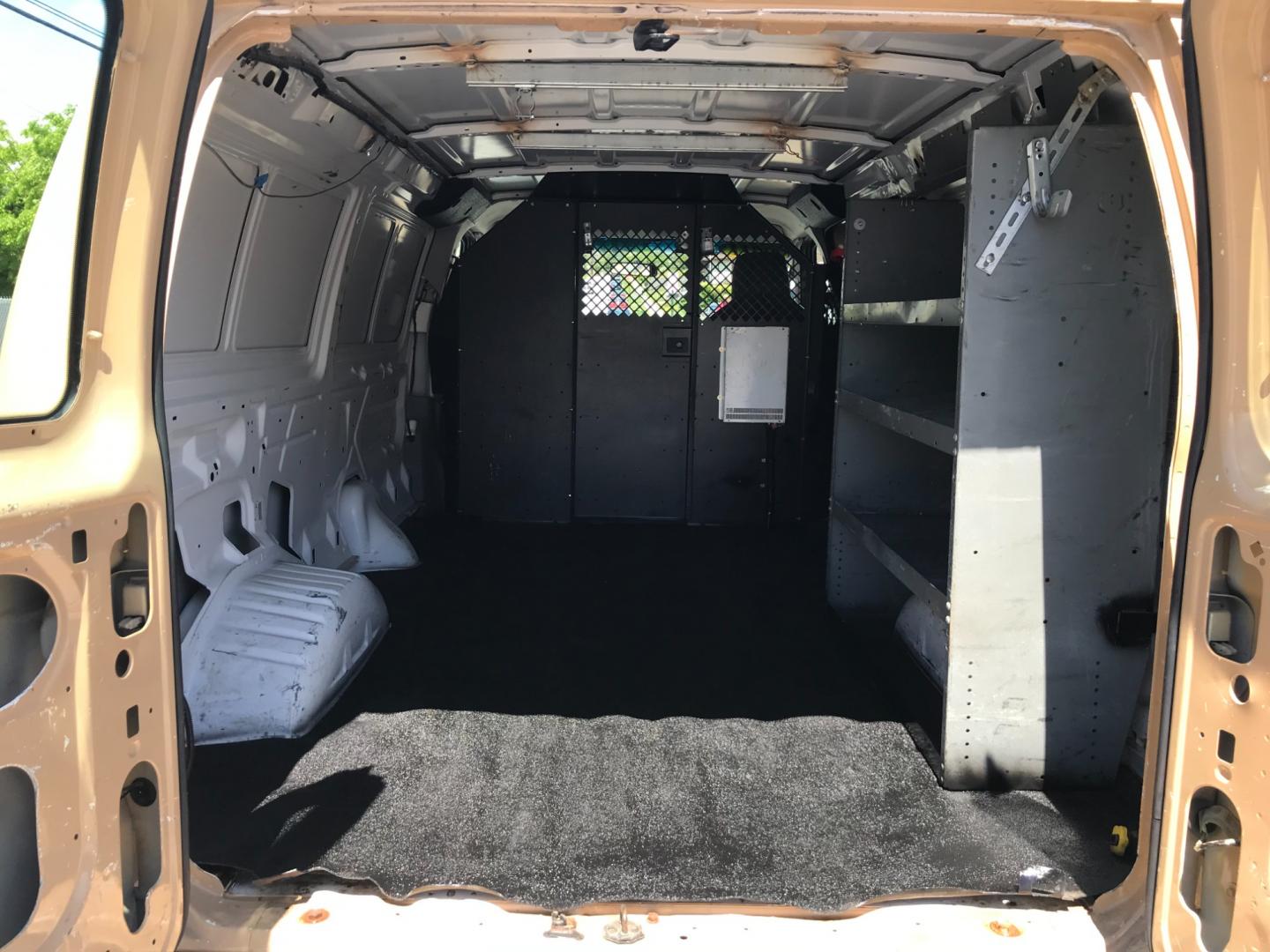 2011 Tan /Gray Ford E-Series Van E250 (1FTNE2EW5BD) with an 4.8 V8 engine, Automatic transmission, located at 577 Chester Pike, Prospect Park, PA, 19076, (610) 237-1015, 39.886154, -75.302338 - 2011 Ford E250 Cargo Van: Ladder racks, shelving, heavy duty partition, power inverter, fully metal body, FLEET MAINTAINED, runs LIKE NEW! This vehicle comes inspected and has been given a bumper to bumper safety check. It is very clean, reliable, and well maintained. We offer a unique pay plan t - Photo#16